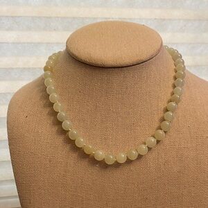 Classic Jade bead necklace with 10K solid gold clasp on string